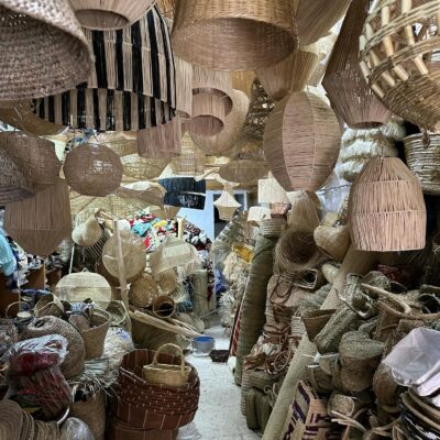 A captivating display of handmade wicker and rattan items in a traditional craft store. Explore the artistry.