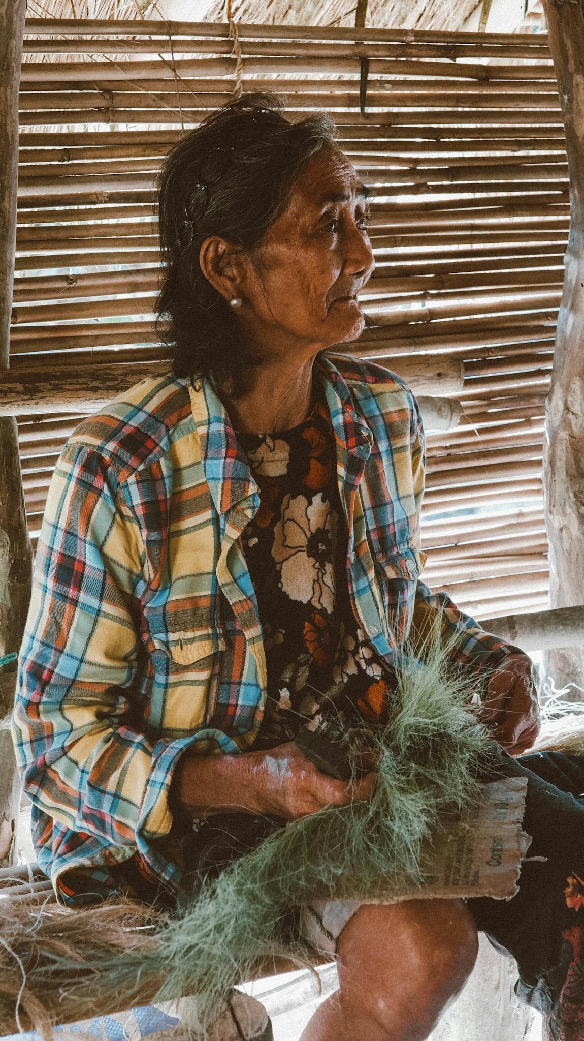 Services 5 senior woman making a headdress at a